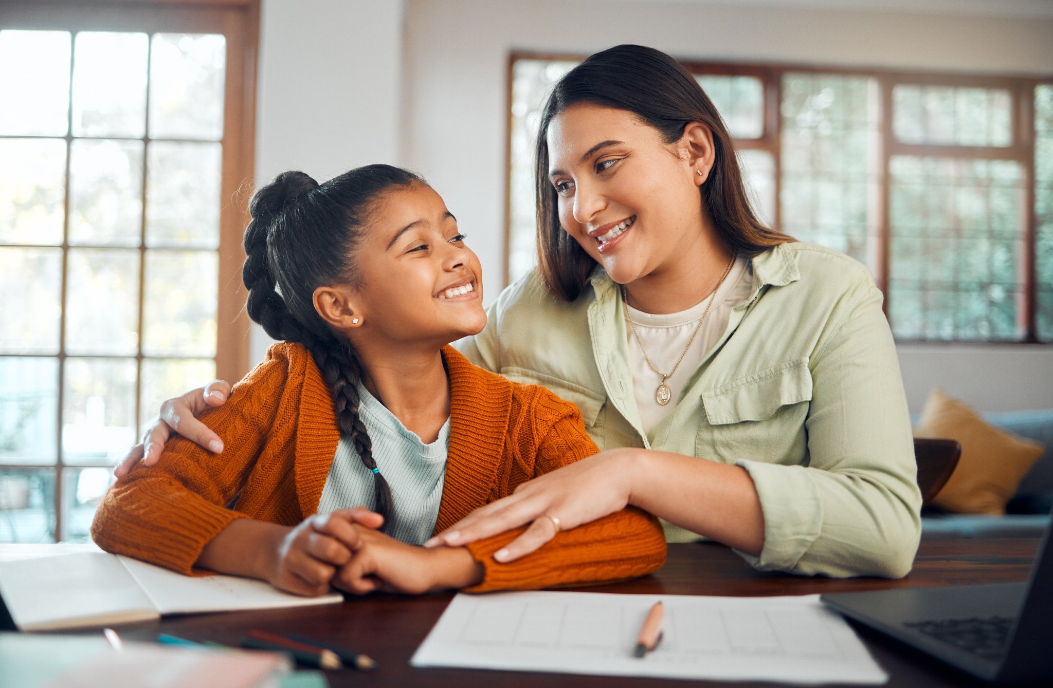 Mother and daughter learning together at home